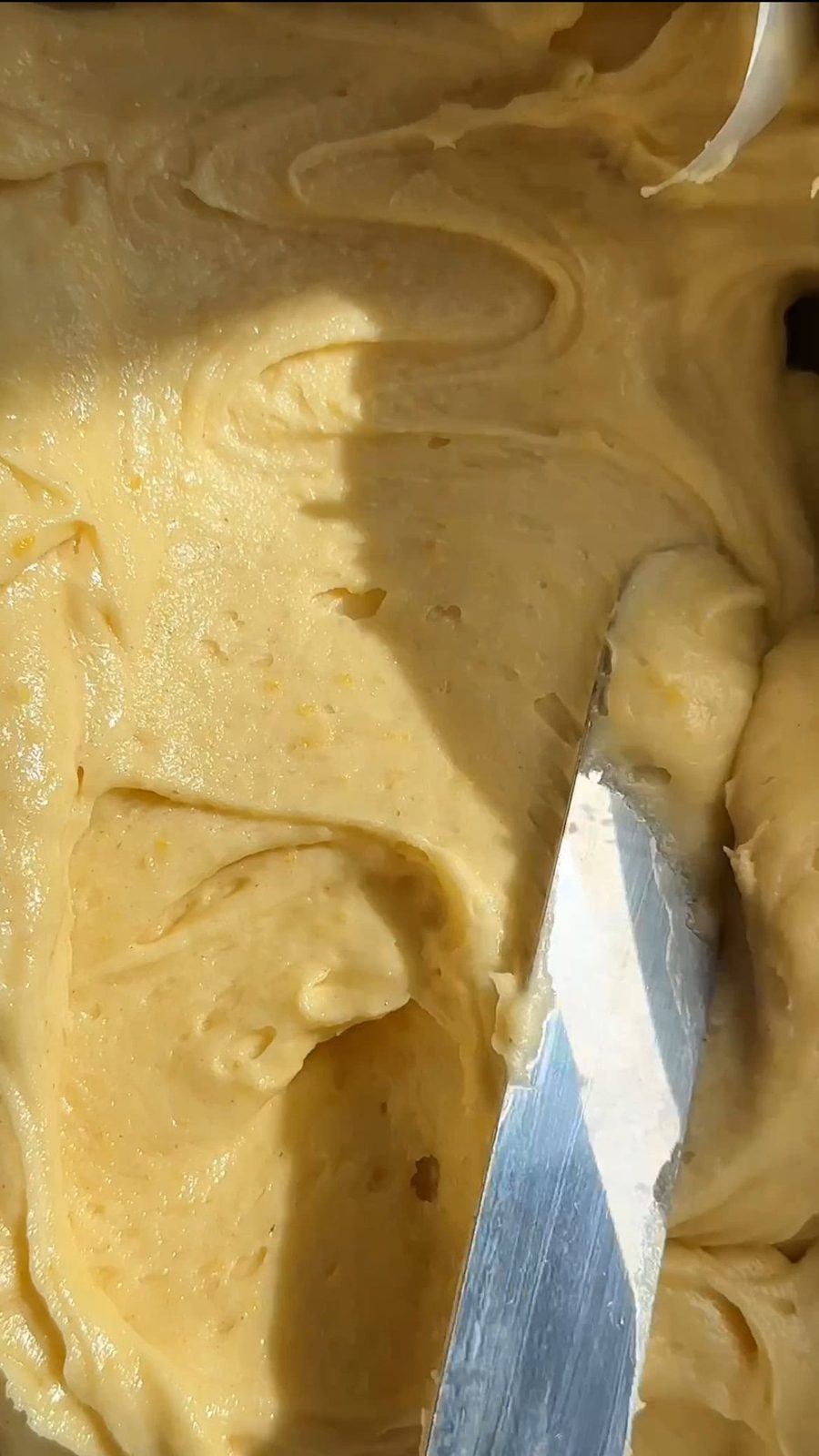 Smoothing the cake batter in the Pan.