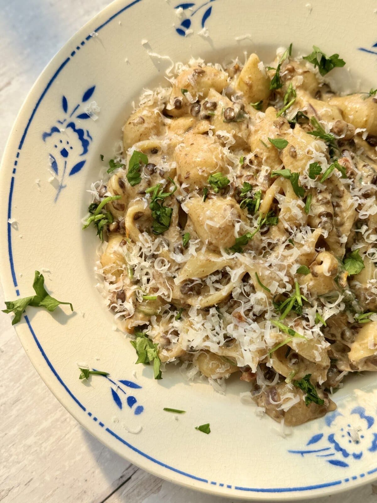 lentil ragu with pasta in a bowl.