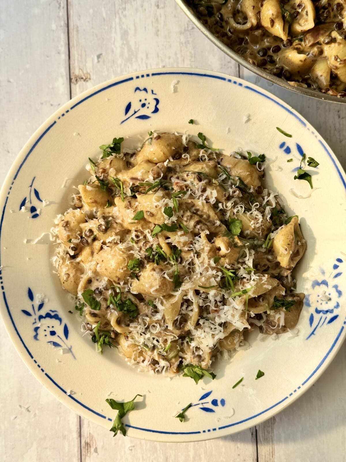lentil ragu with pasta in a bowl.