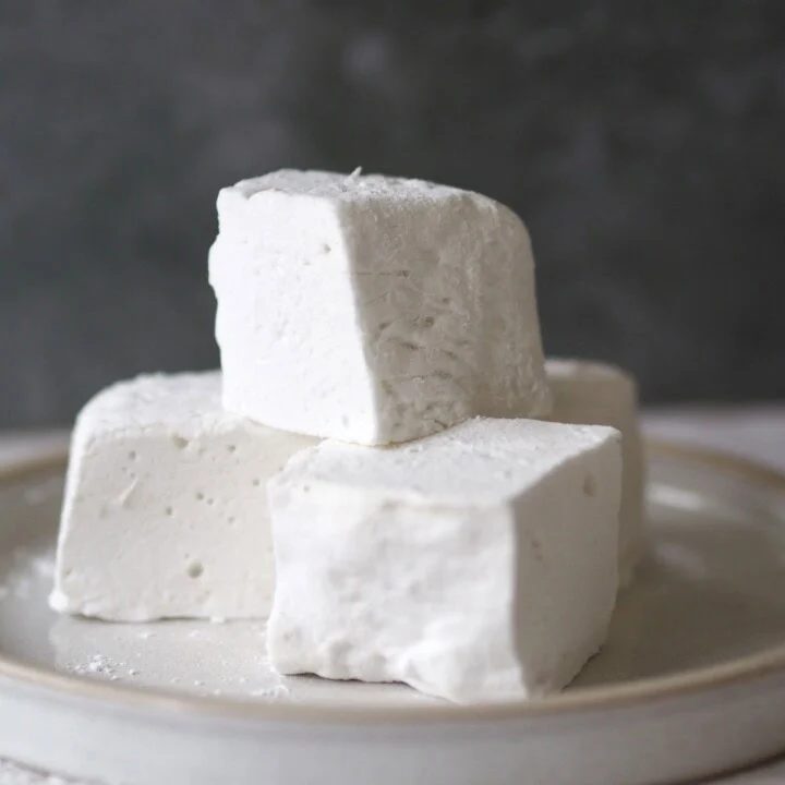 a stack of marshmallows on plate.