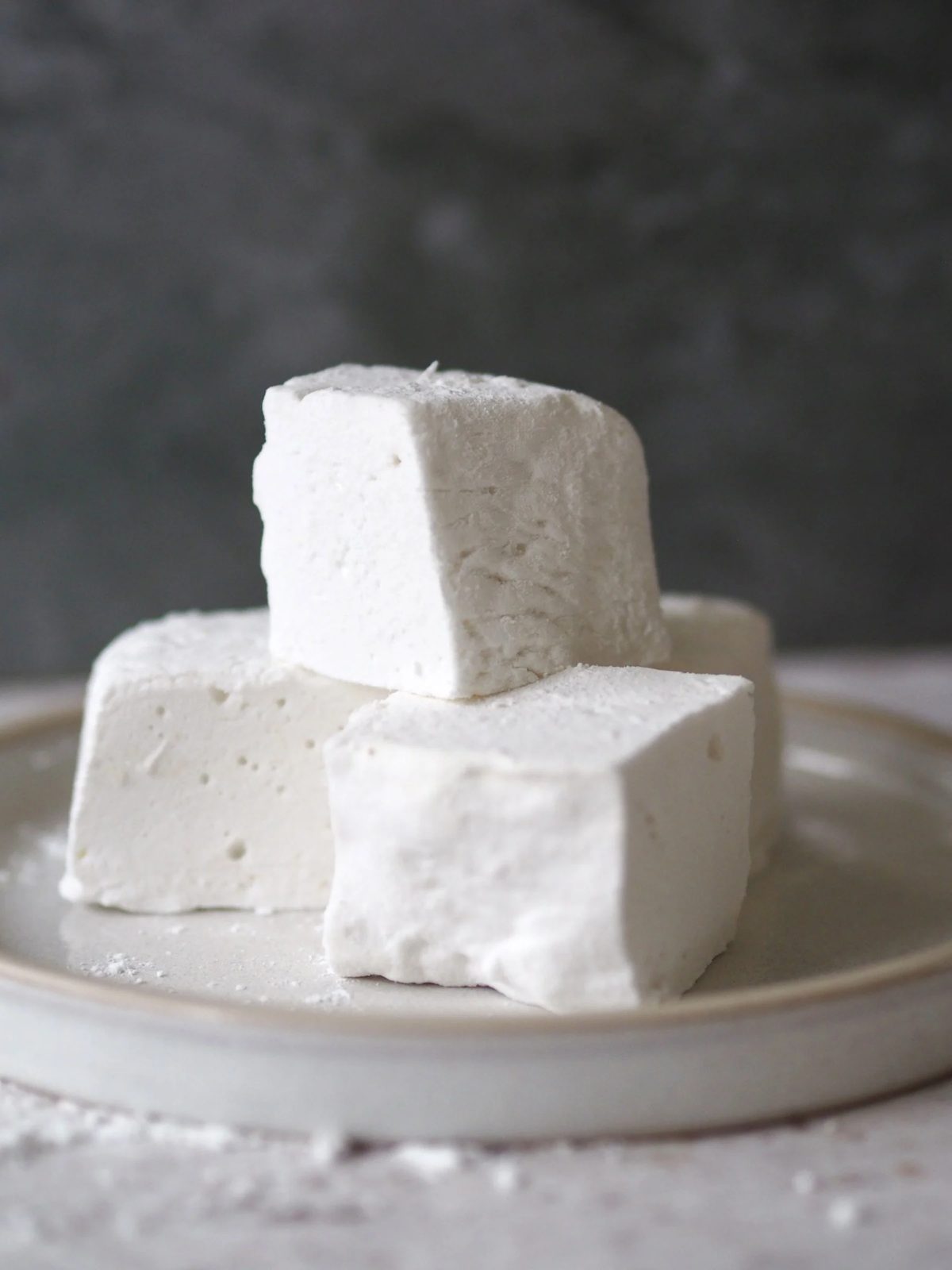 a stack of marshmallows on plate