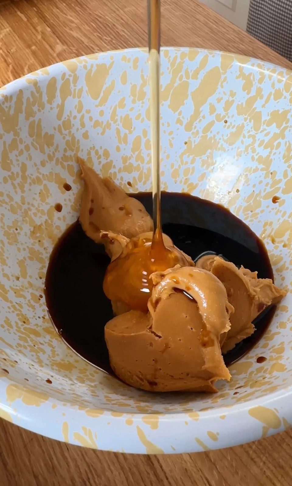 mixing up the peanut butter sauce.