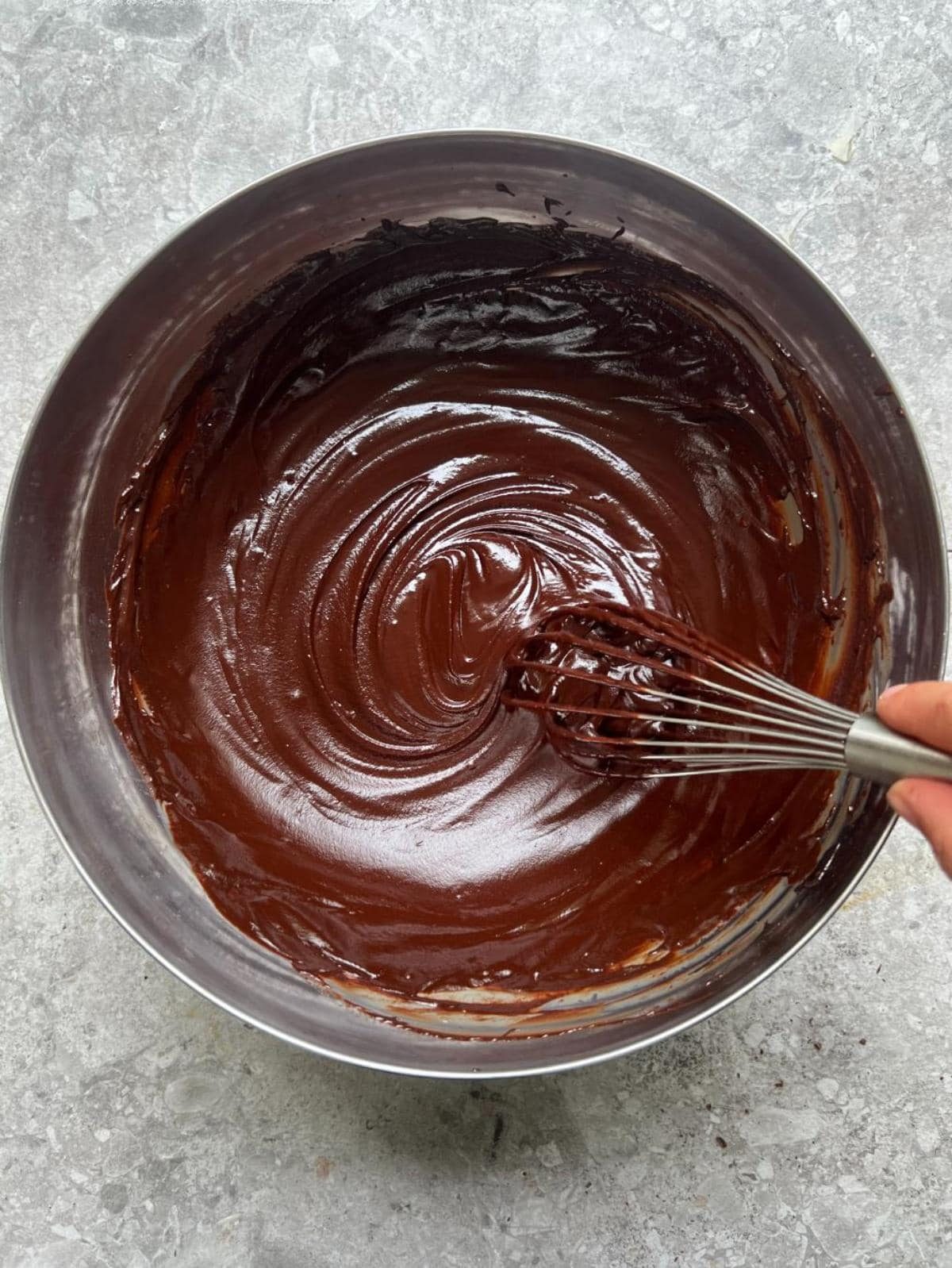 melted chocolate ganache in a bowl.