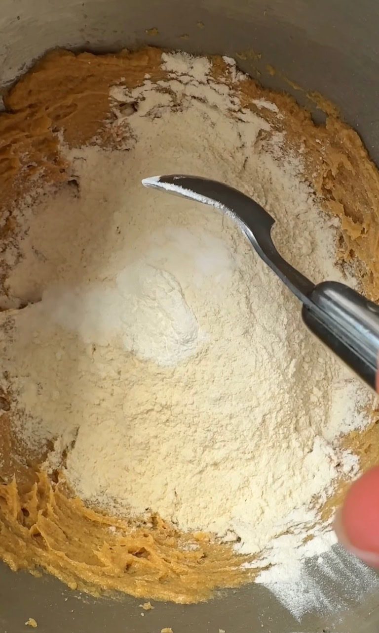 adding flour and baking powder.