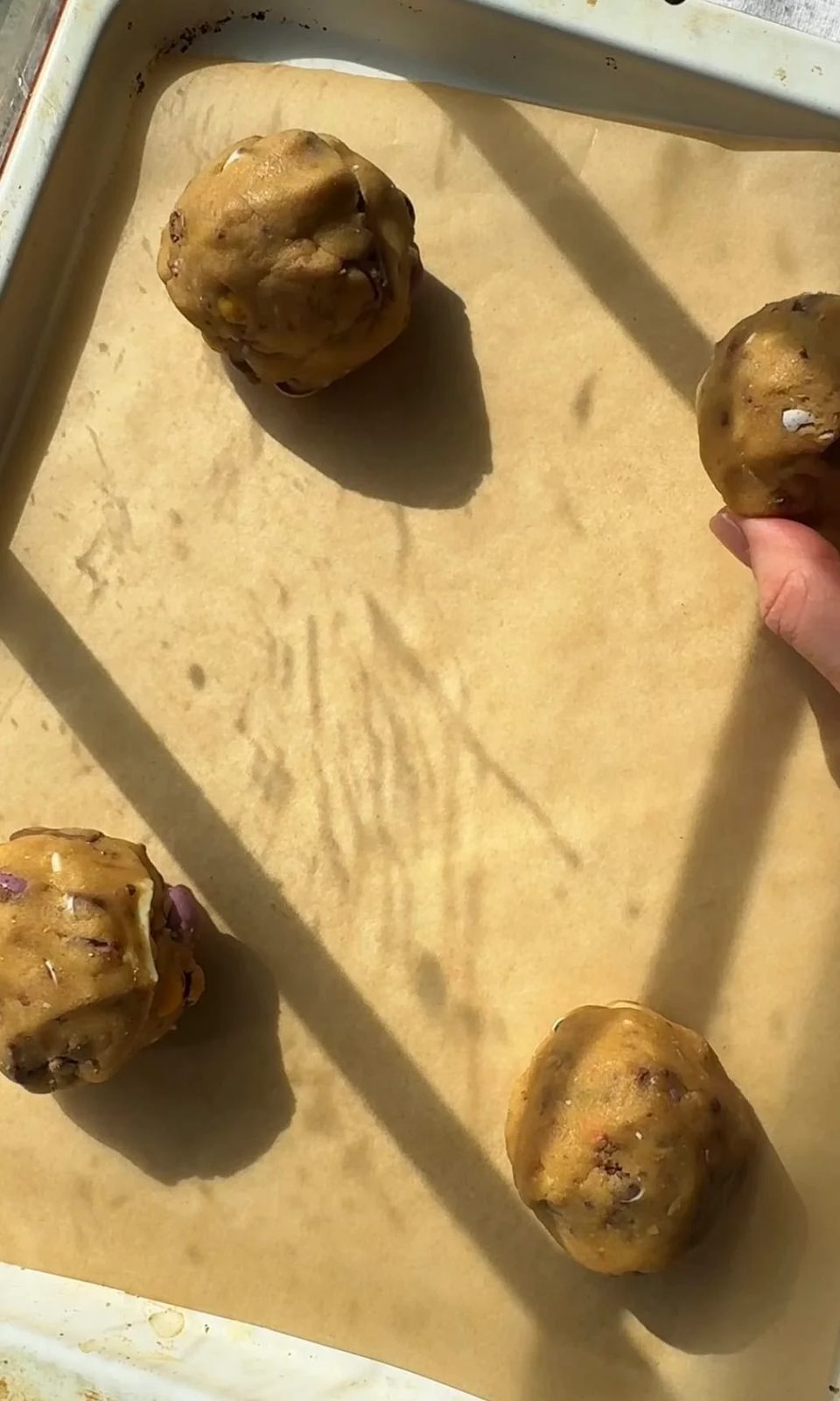 rolling balls of dough.