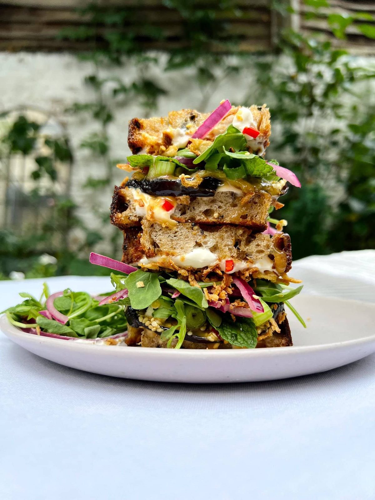 Miso Caramel Crispy Aubergine With Sour Cream, Chilli, Pickled Red Onion And Rocket