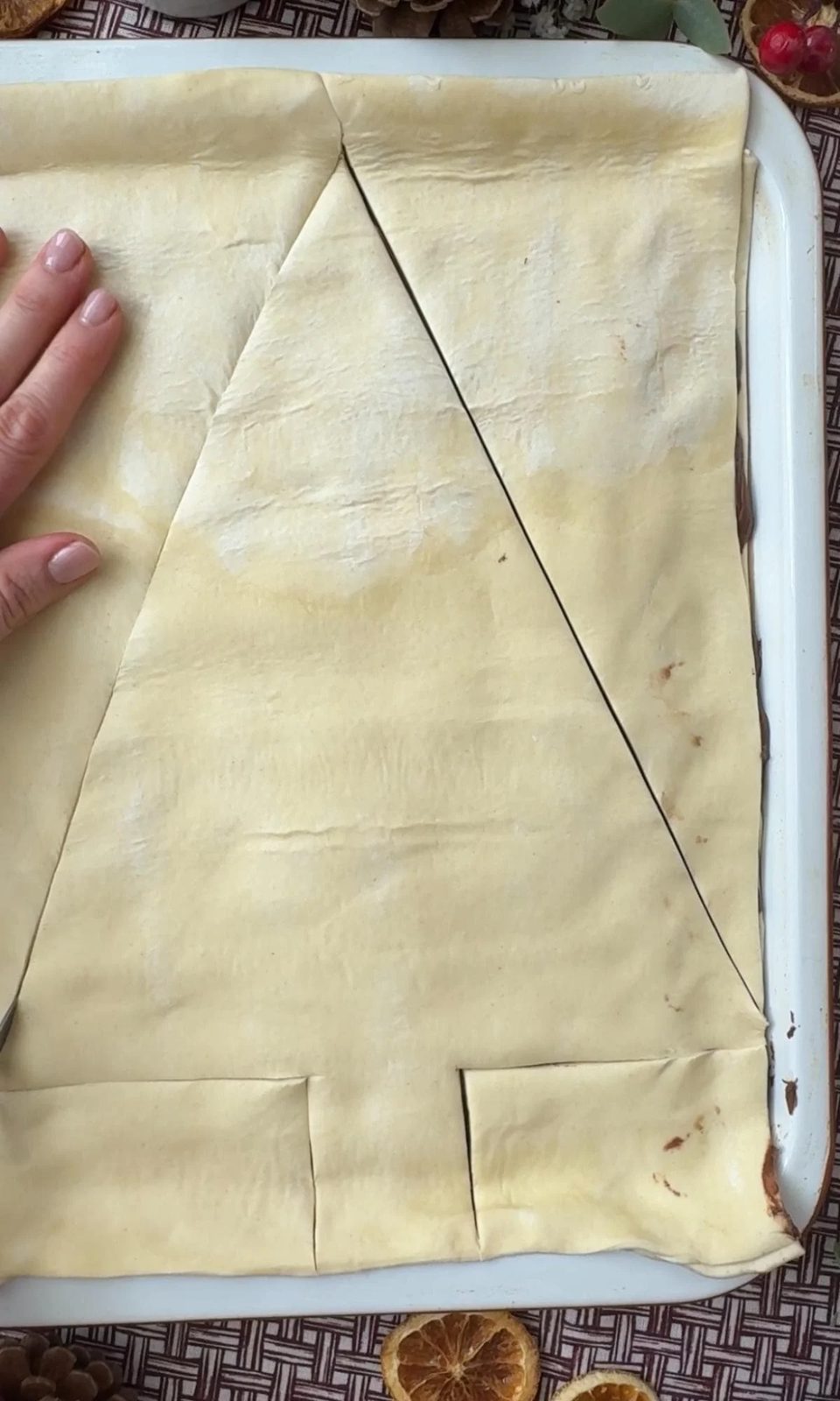 cutting out the tree shape.