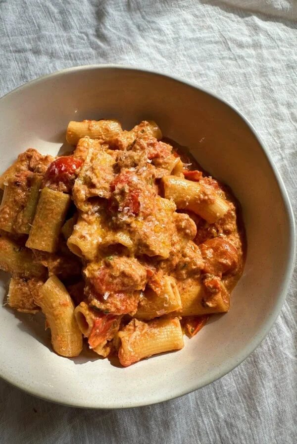 spicy tuna pasta in a white bowl