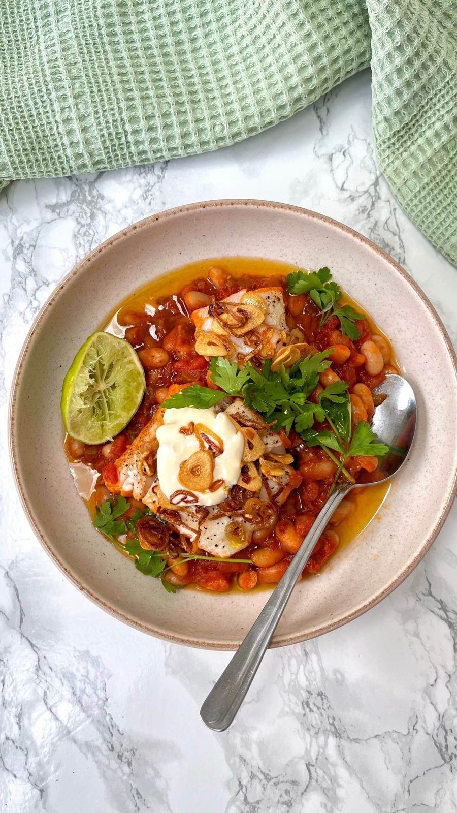 One Pan Poached Fish, With Brothy Tomato Beans, Frazzled Shallots, Crispy Garlic And An Easy Saffron Aioli