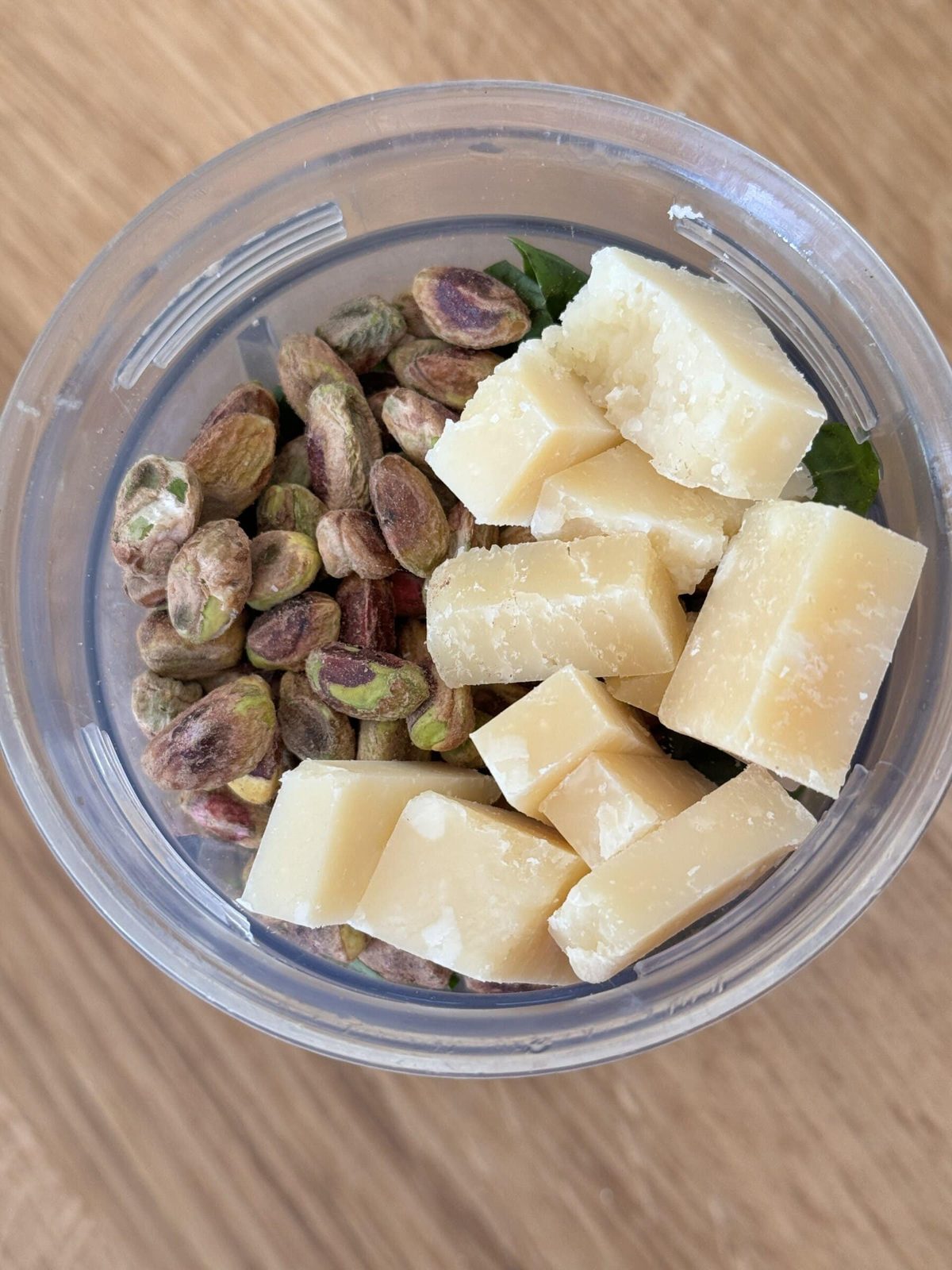 Parmesan chunks in blender with other pistachio pesto ingredients.