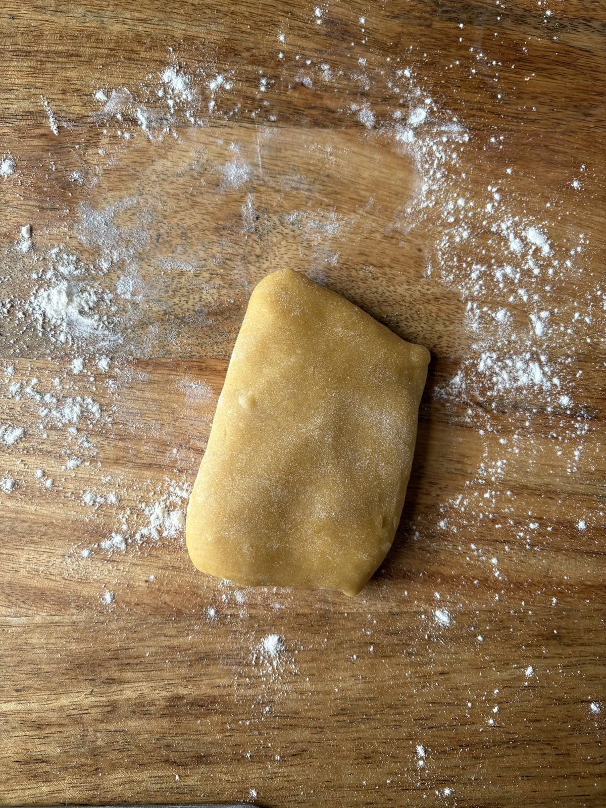 rolling the dough into rectangles.