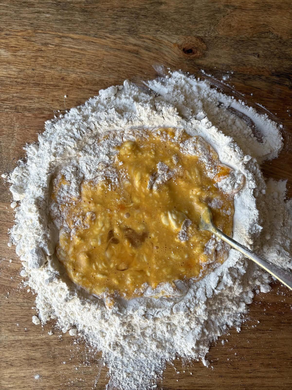 incorporating flour into the eggs.