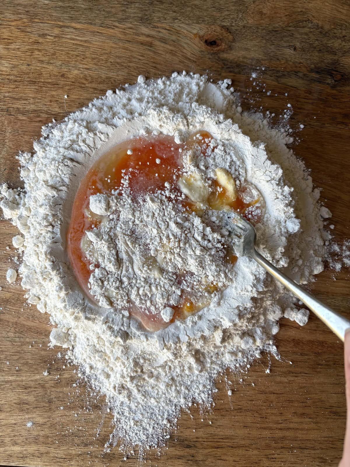 incorporating flour into the eggs.