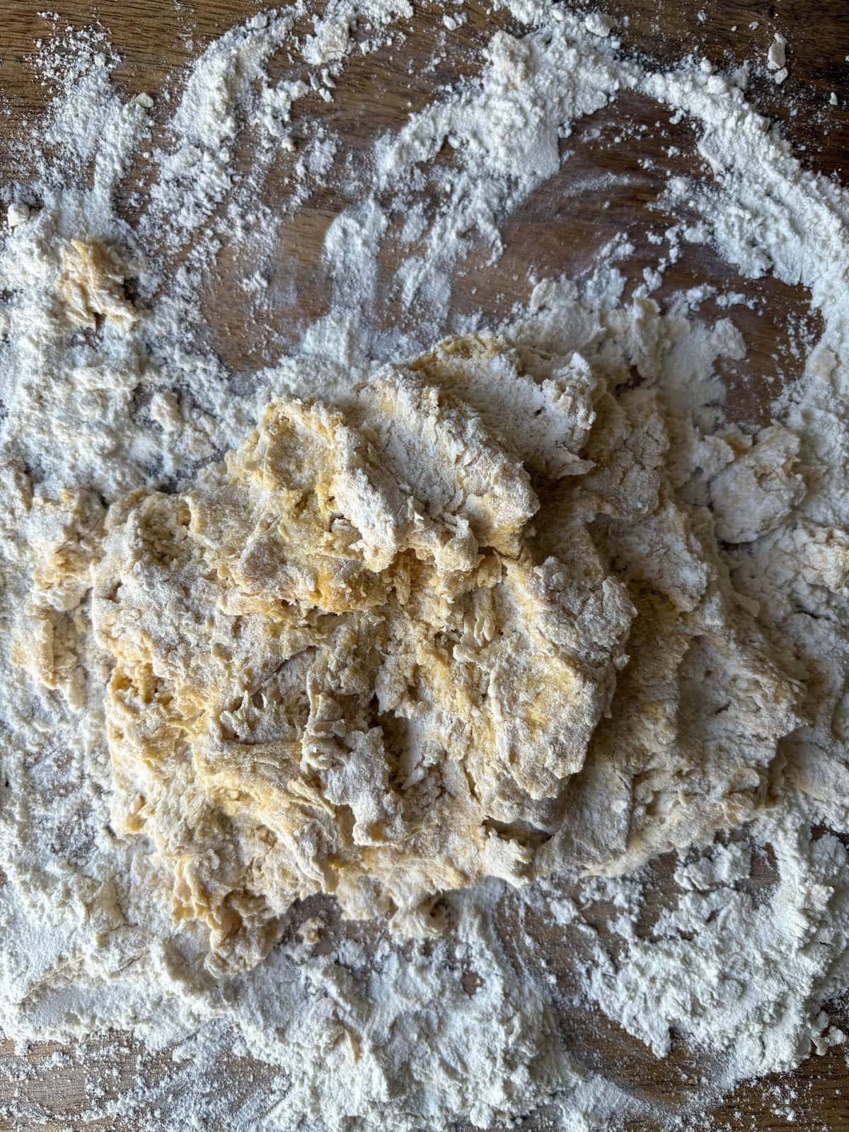 bringing the pasta dough together,