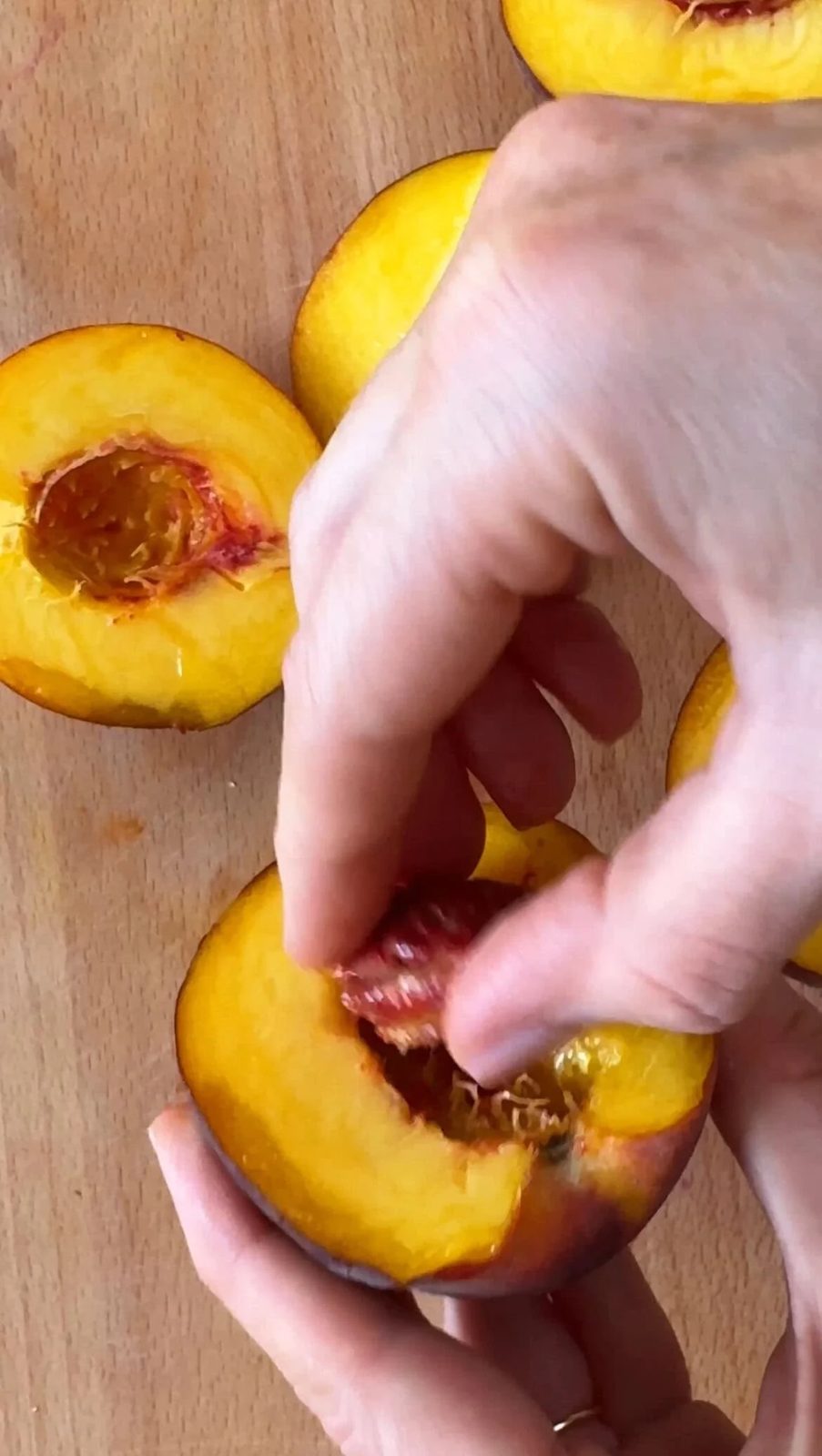 destoning the peaches for peaches and cream.