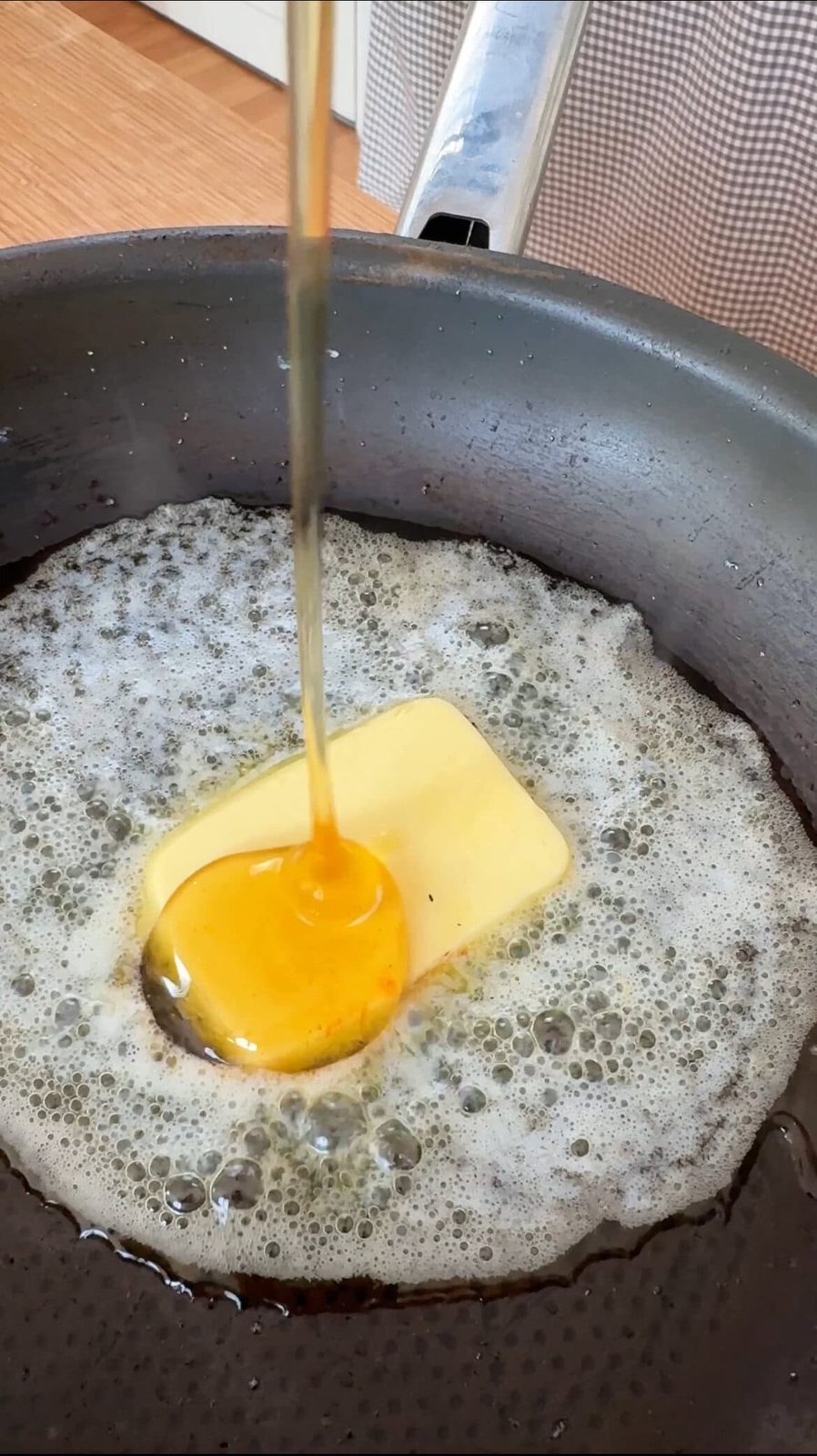 making caramel for peaches and cream.