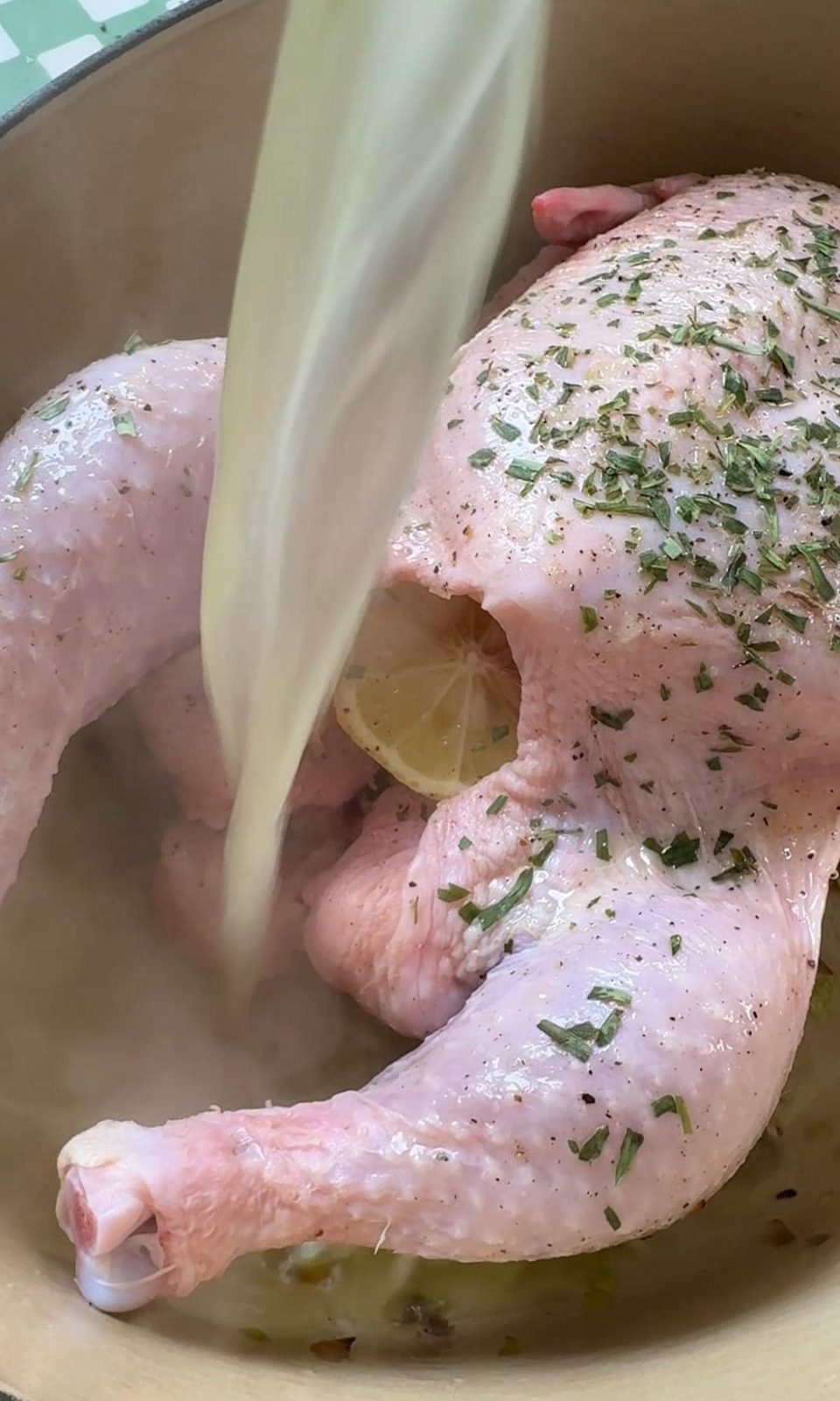 adding stock to poule au pot.