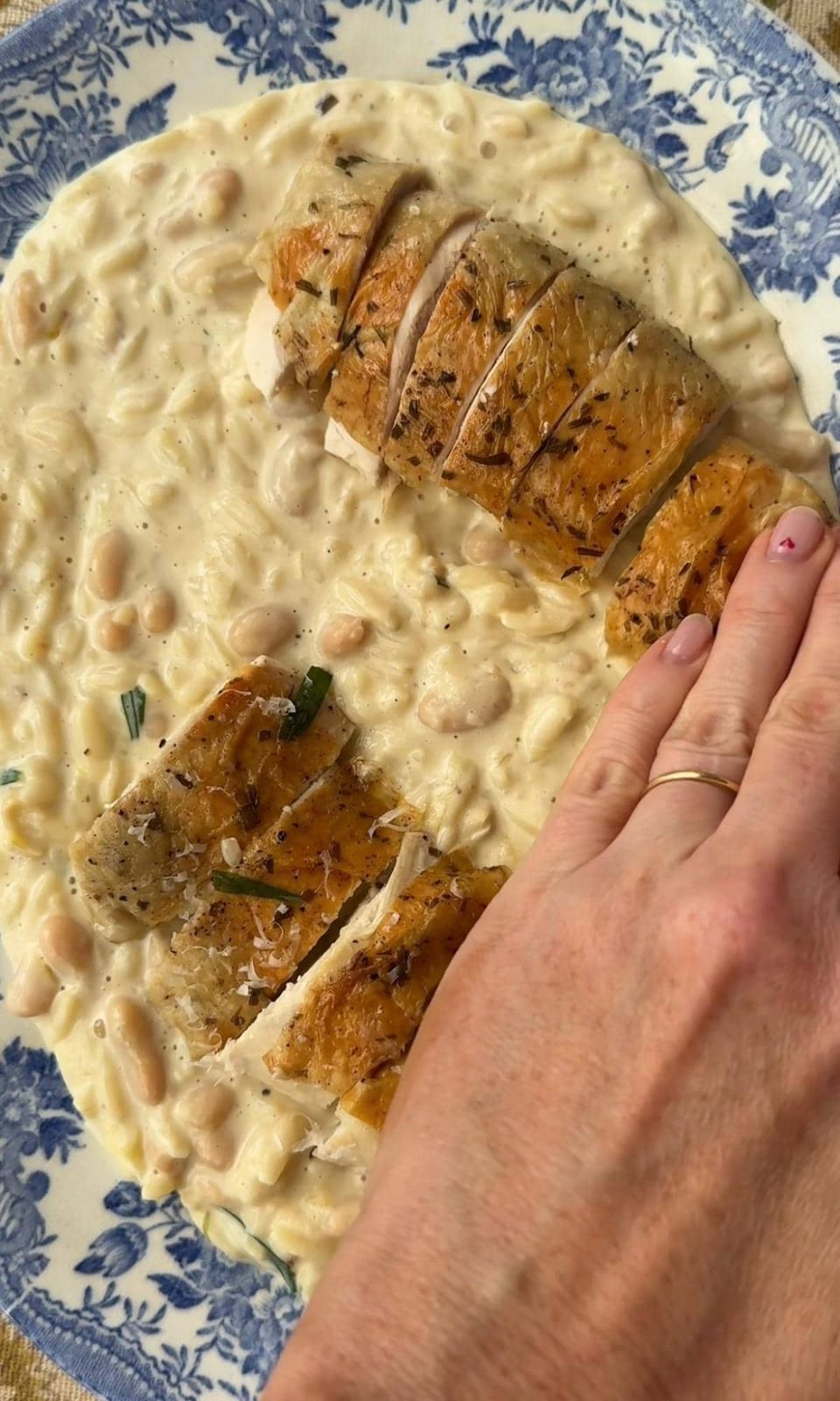 topping creamy beans with the chicken.