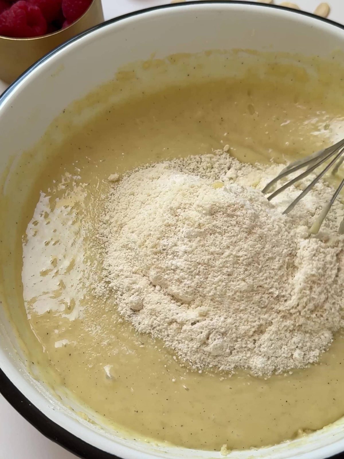 Adding dry ingredients. Then whisk gently to combine.
