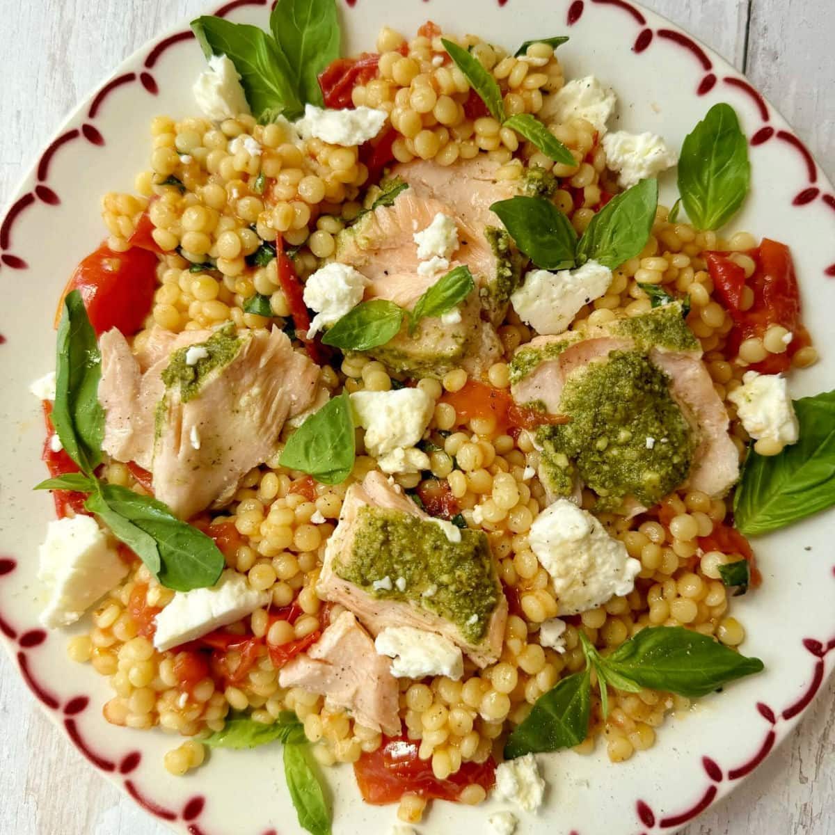 Salmon With Pesto Crust & Roasted Tomato Giant Couscous Salad