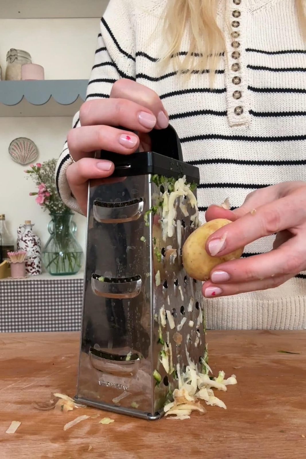 grating potato.