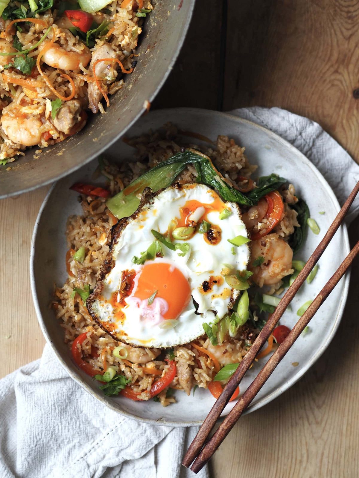 Bowl of Shrimp and Chicken Fried Rice with fried egg.