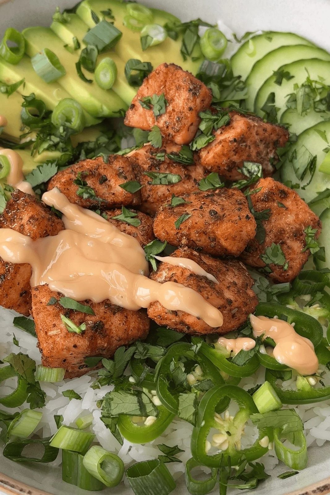 plate up the spicy salmon bowl.