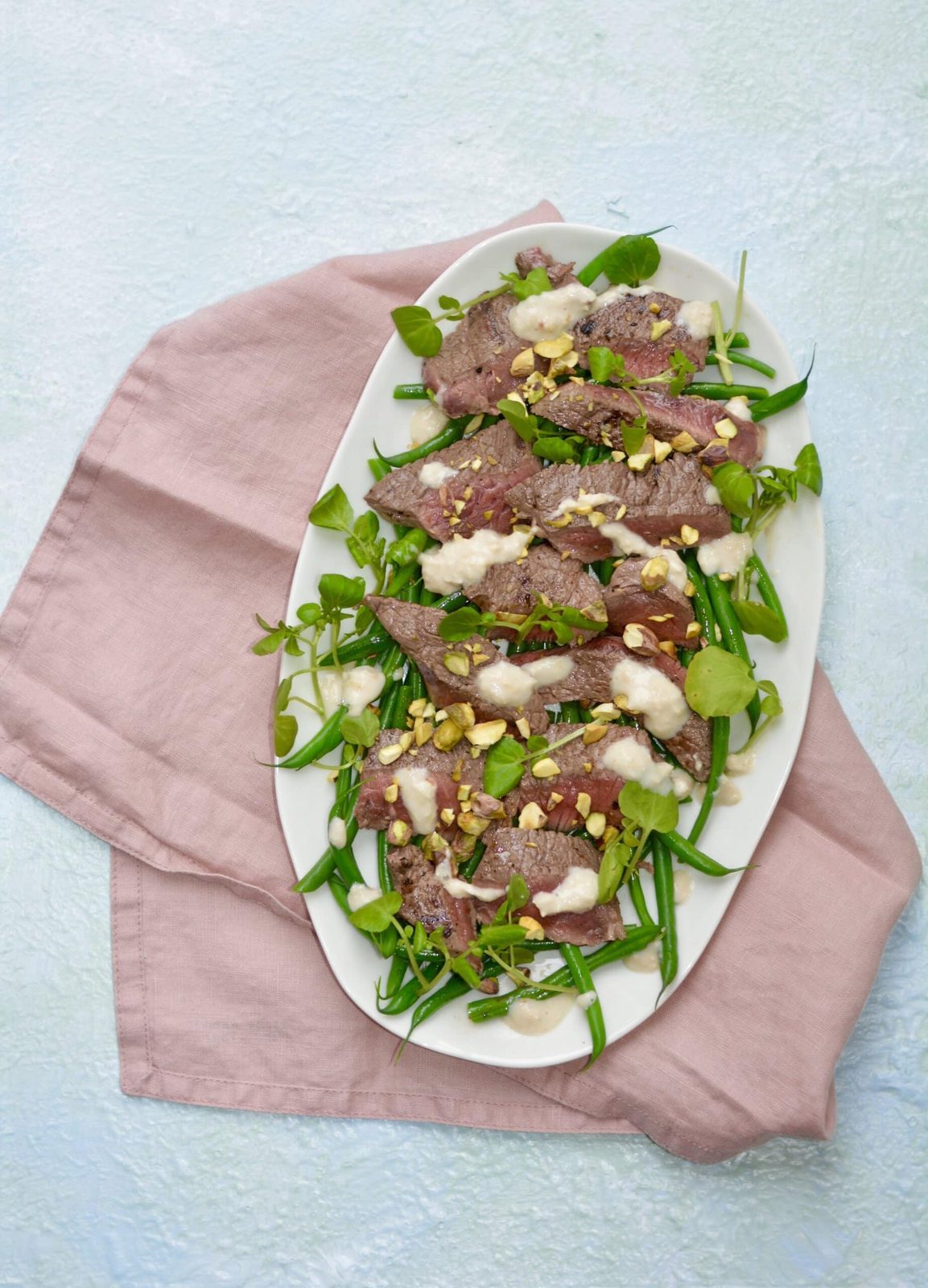 Steak With Garlicky Green Beans, Pistachios & Horseradish