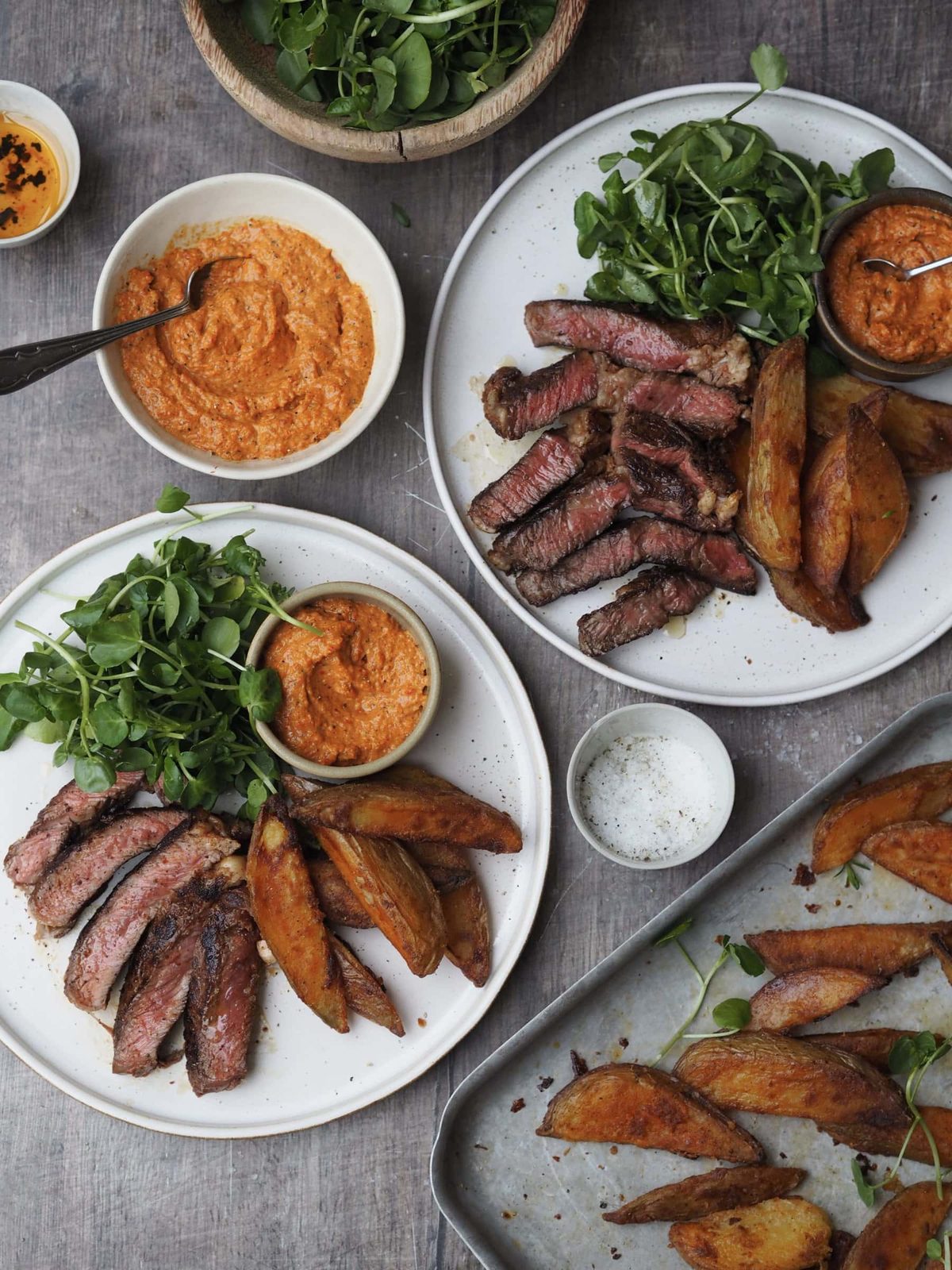 Steak with Romesco Sauce and Crispy Potato Wedges