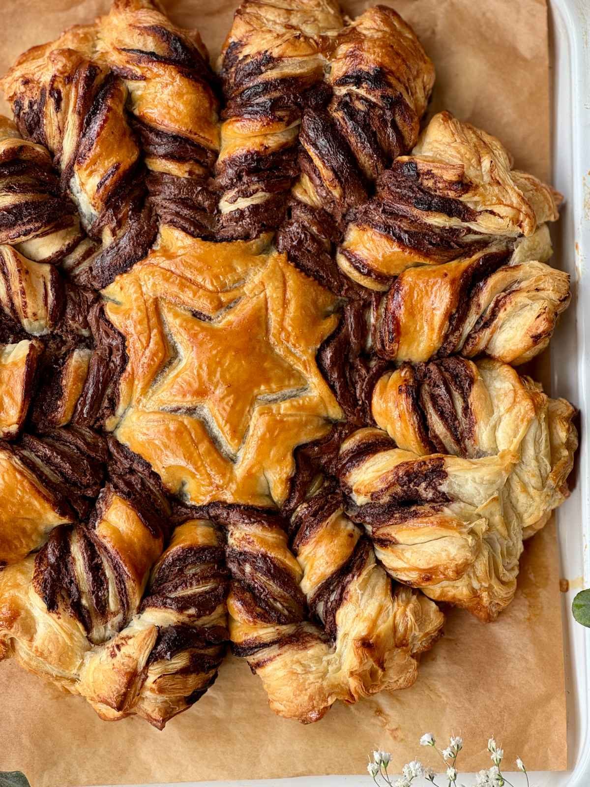 tarte soleil on a board with star design.