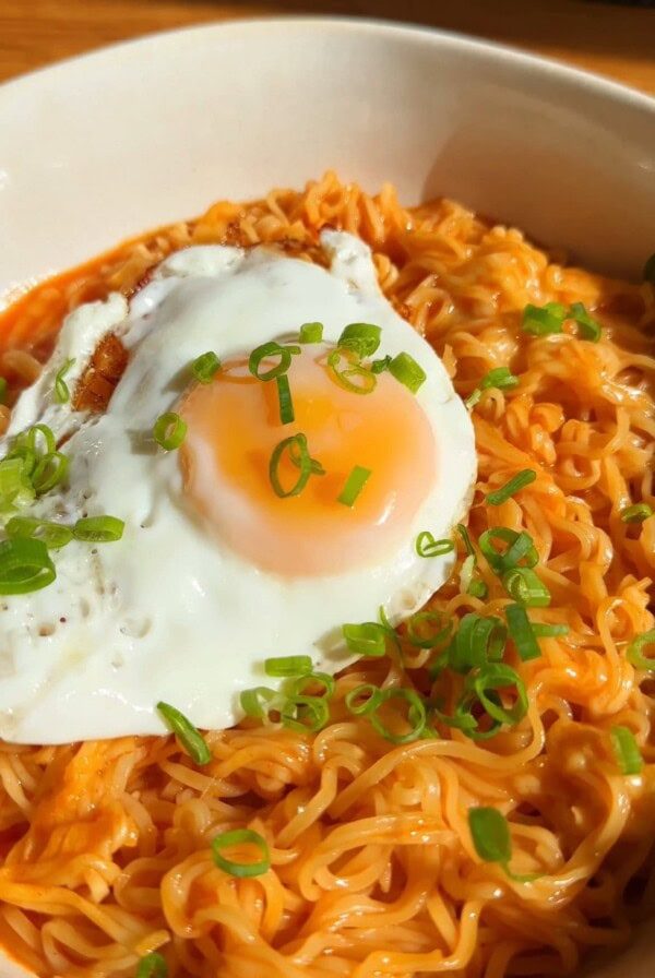 Korean Spicy Ramen Noodles with cheese and a fried egg on top