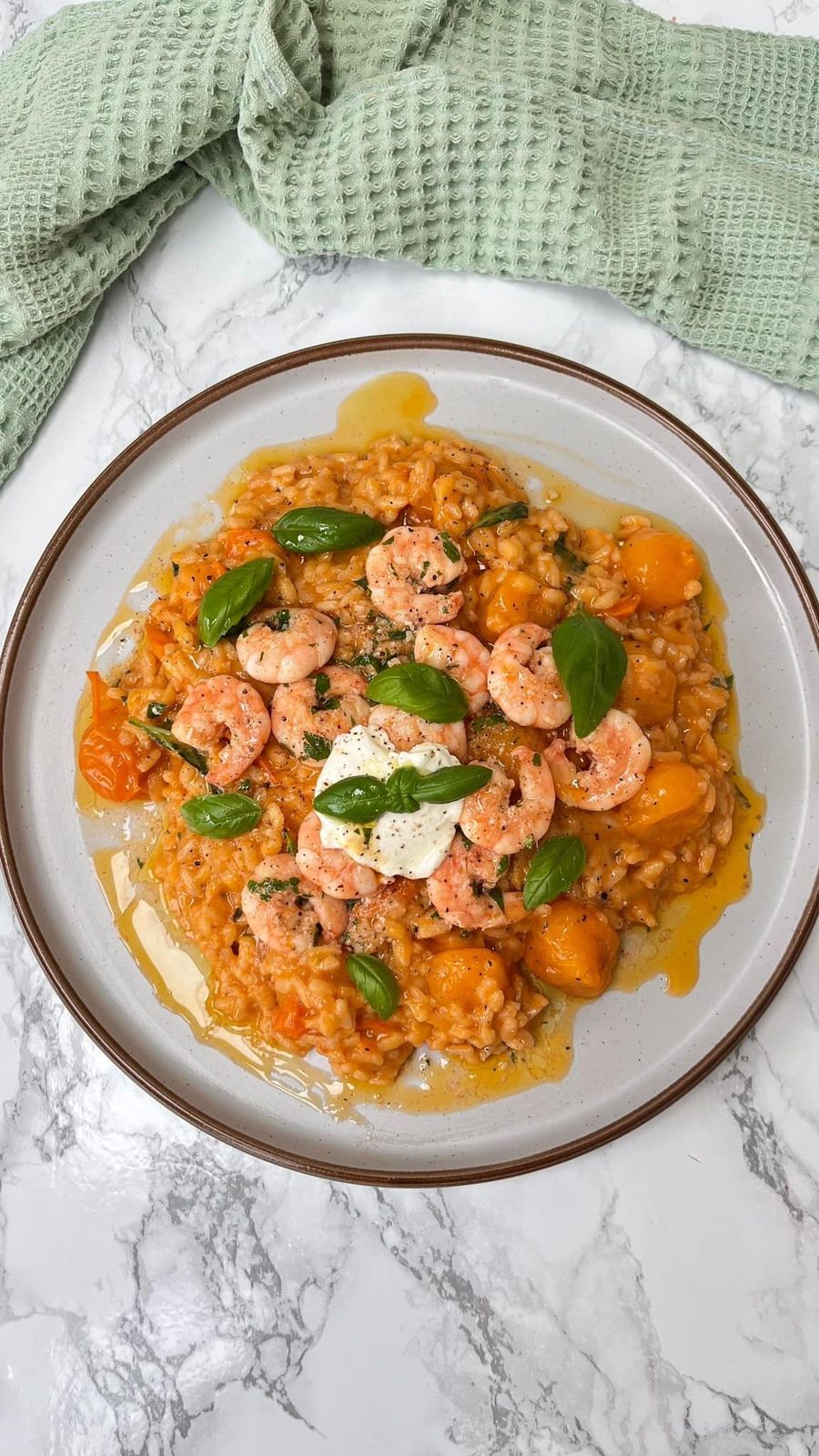 tomato mascarpone risotto with garlic prawns.