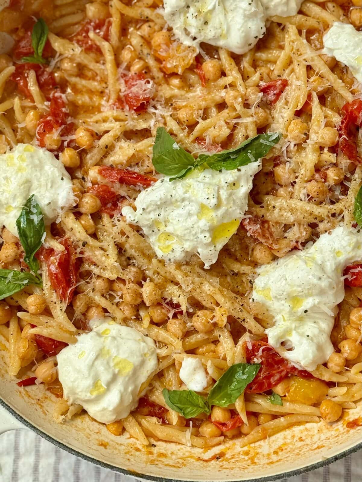 trofie pasta in a pan with mozzarella.