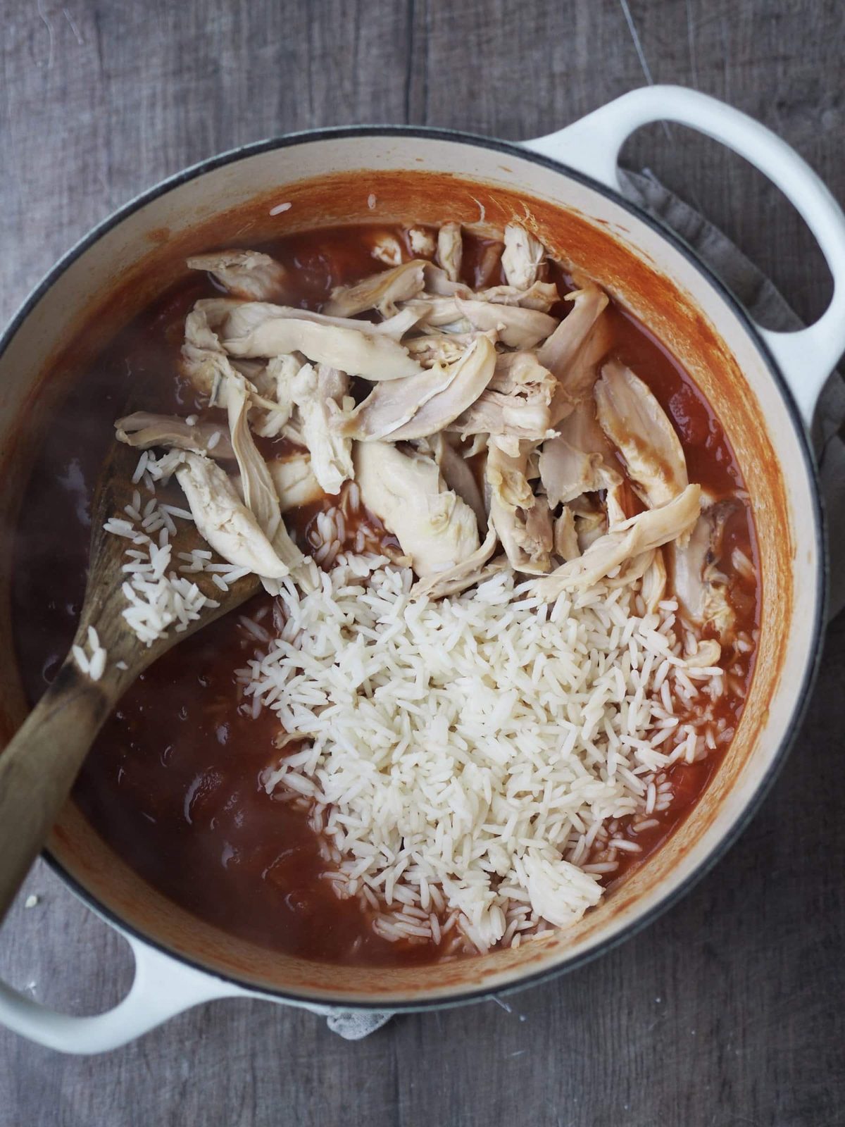 Adding tukey and rice to the soup stock