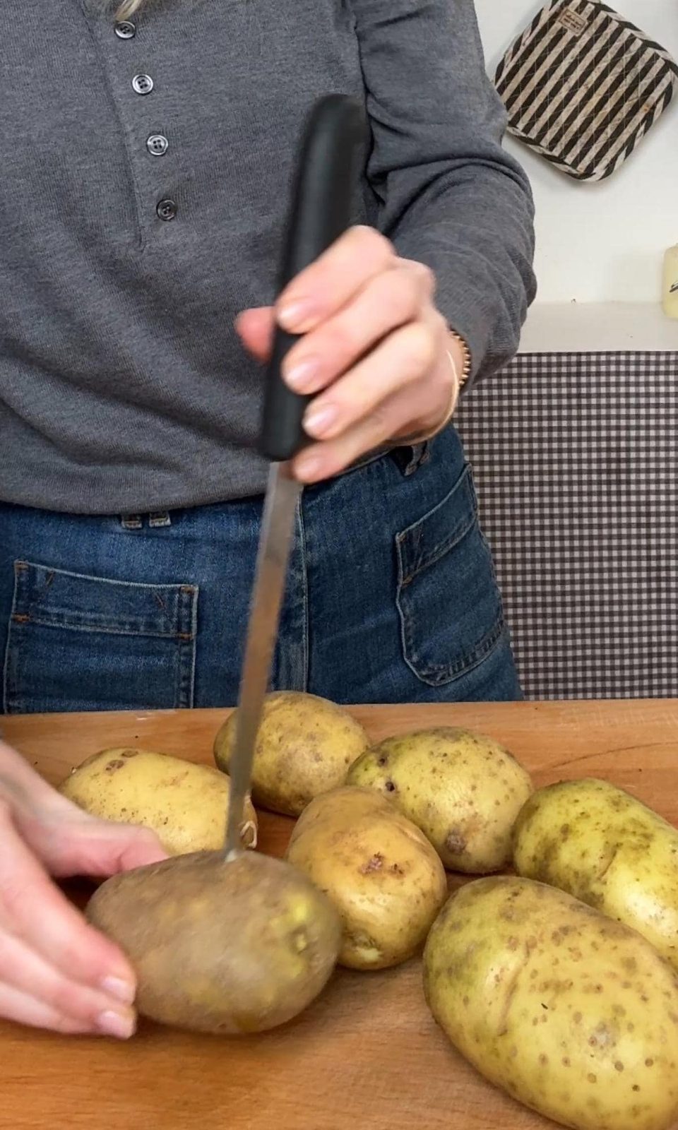 piercing baked potatoes.