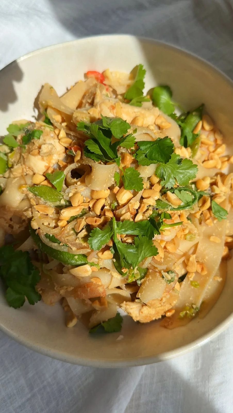 Wagamama Pad Thai in bowl with fresh cilantro garnish.