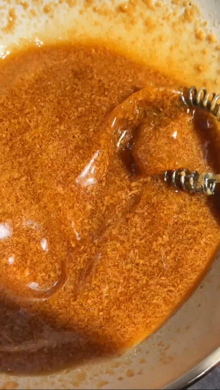 Mixing Pad Thai sauce in small bowl.