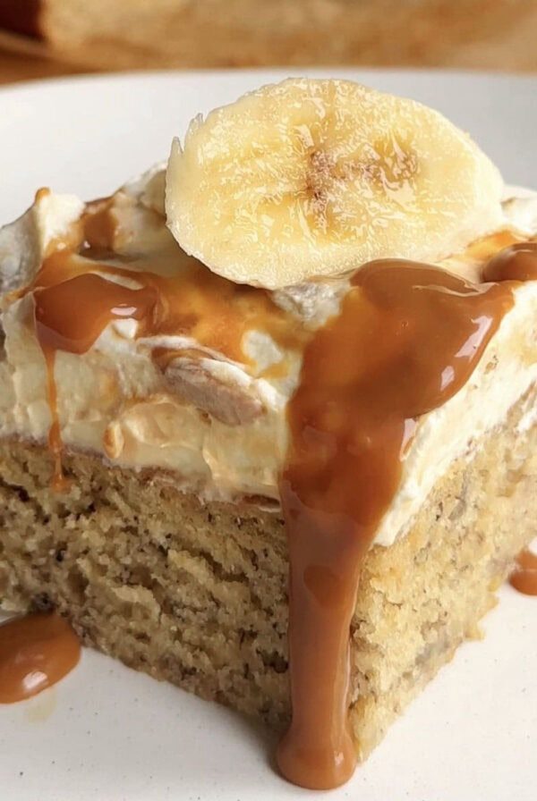 banana bread bars, thick white icing with caramel sauce.