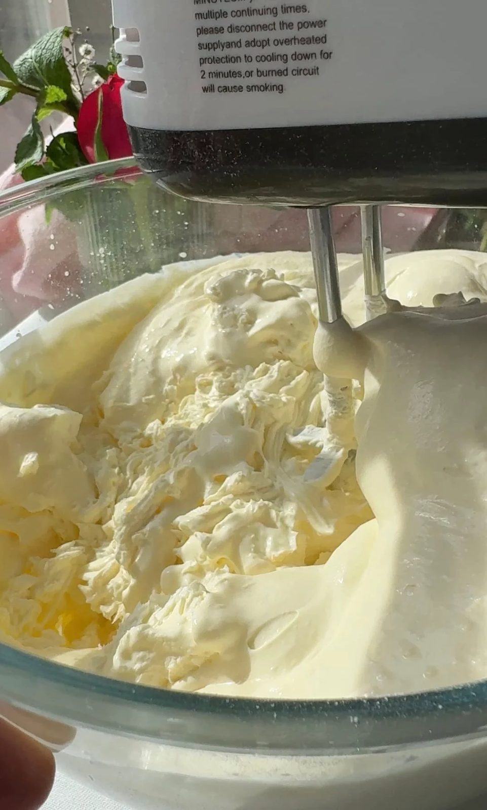 Whipping mascarpone cream.