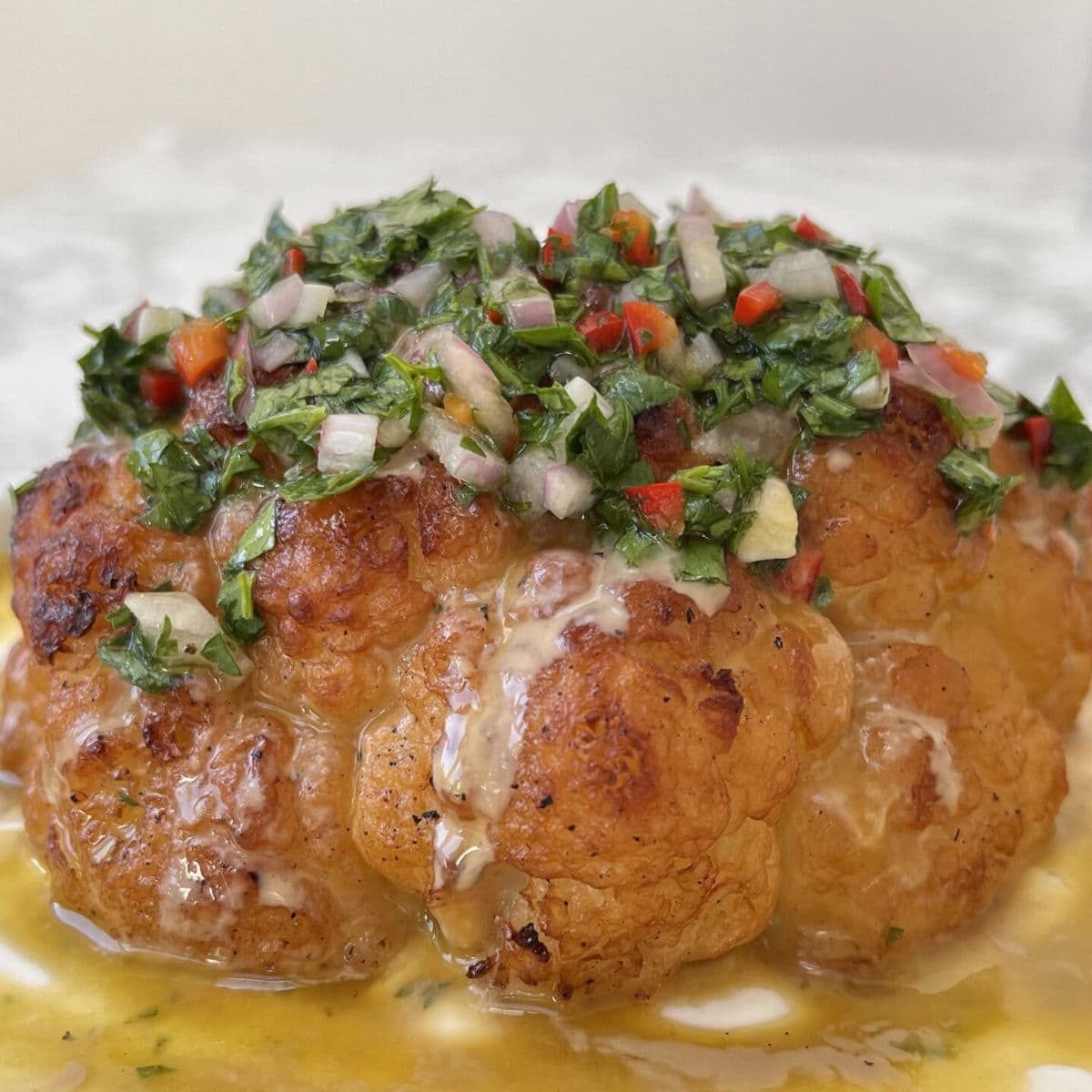 Whole Roasted Cauliflower With Tahini And Chimichurri