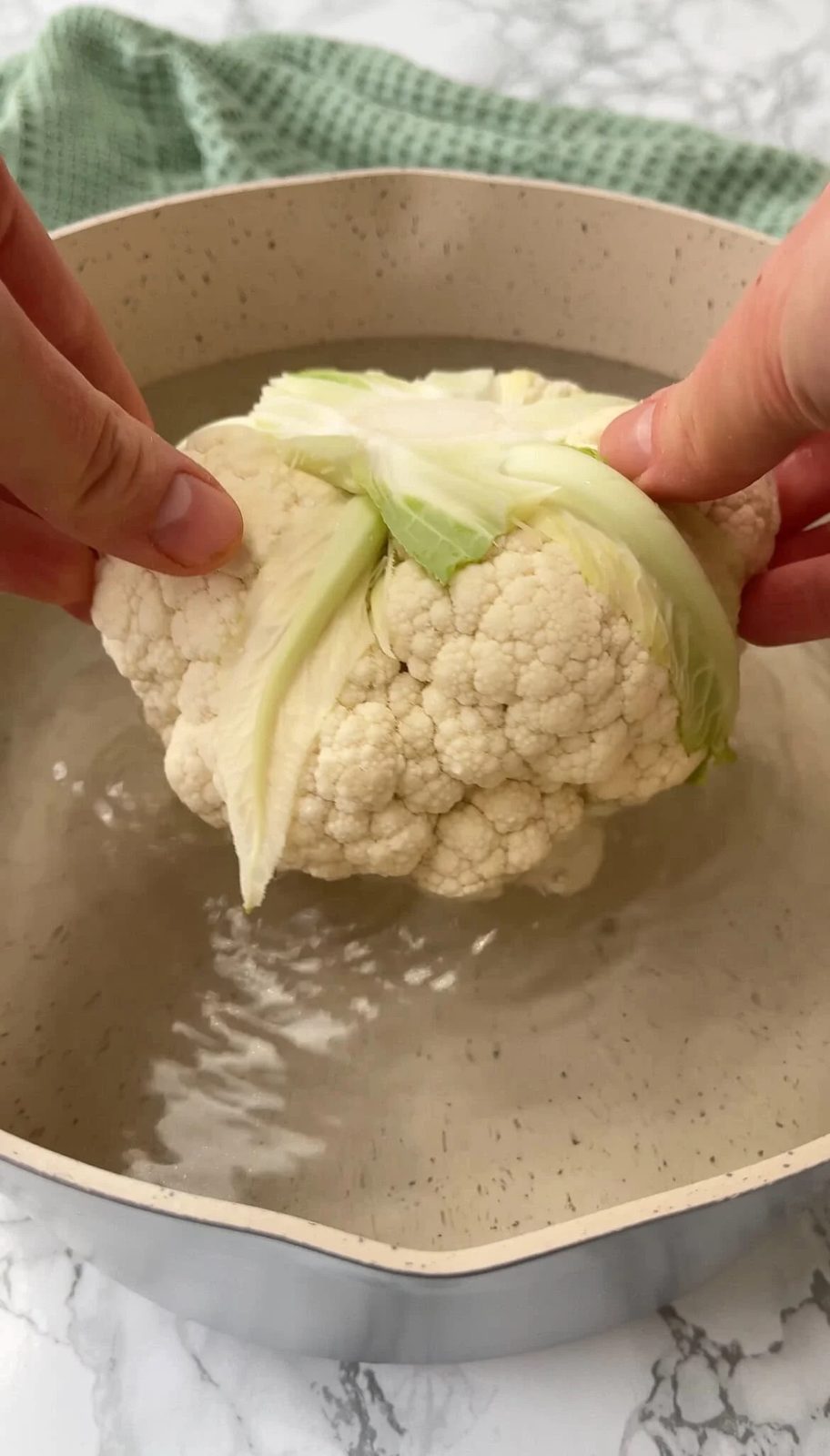 parboiling whole cauliflower.