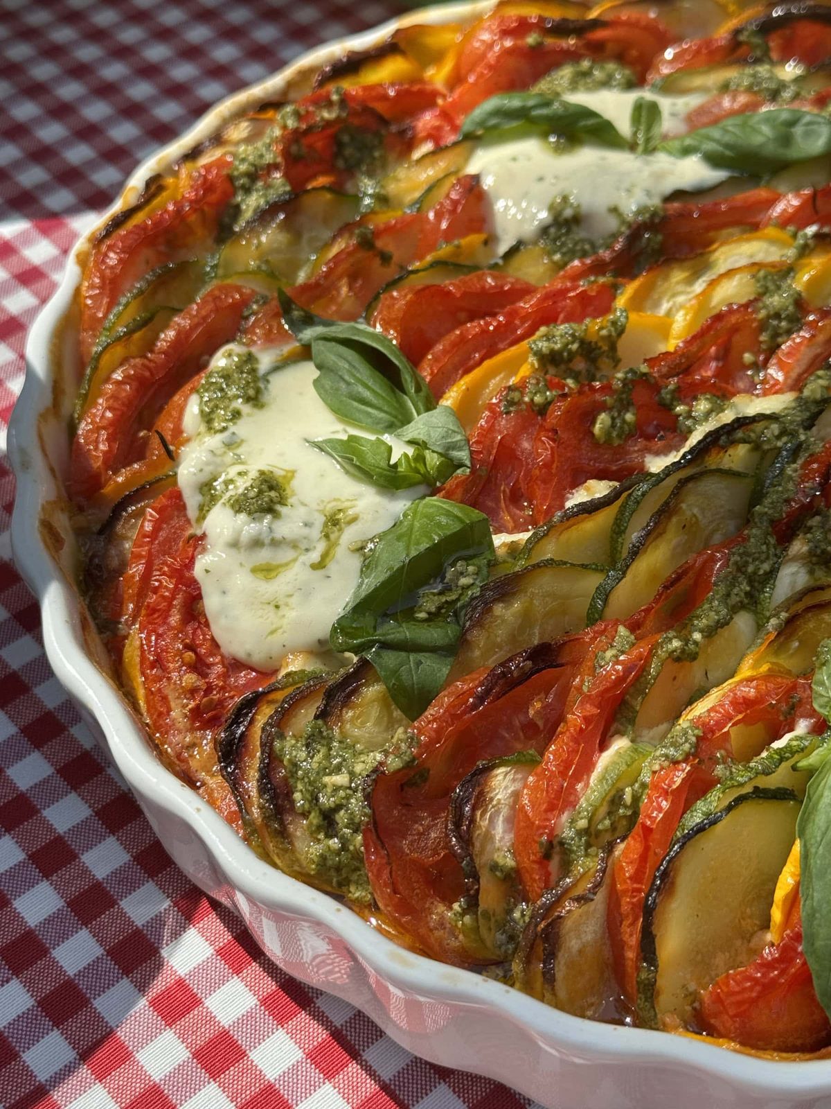 zucchini al forno with tomato and pesto.