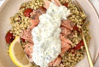 Perfectly Roasted Salmon with Garlicky Tomatoes and Herbed Giant Couscous