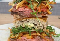 Signature Ribeye Steak Sandwich with Bearnaise Butter