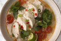 Aromatic Thai Chicken Soup with Rice and Burst Cherry Tomatoes