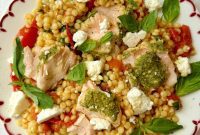 Herbed Salmon with Sun Kissed Tomato Couscous