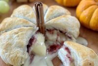 Garlic Cranberry Baked Brie in a Pumpkin Puff Pastry