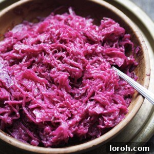 Close up of a bowl of beautifully braised red cabbage, ready to serve.