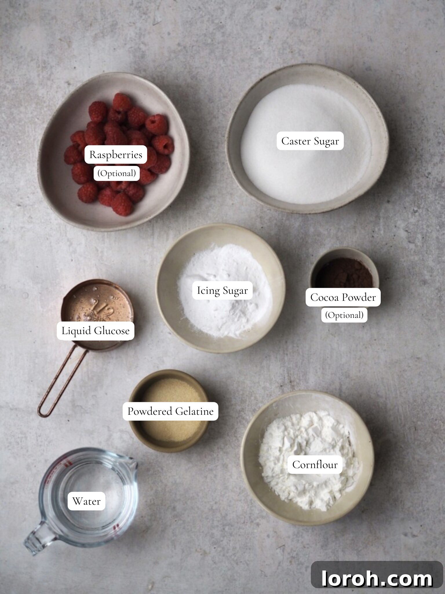 A visual display of the key ingredients required for making homemade marshmallows, neatly arranged for clarity.
