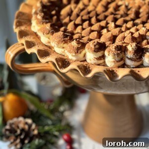Panettone Tiramisu with Baileys in a large bowl, garnished with cocoa.